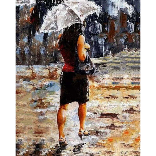 Woman rushing in the Rain
