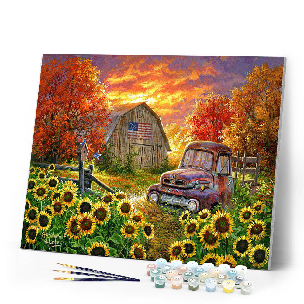 Sunflowers in front of the barn