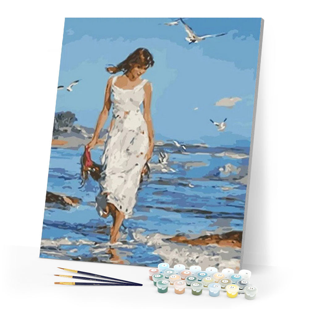 Woman walking by the Sea