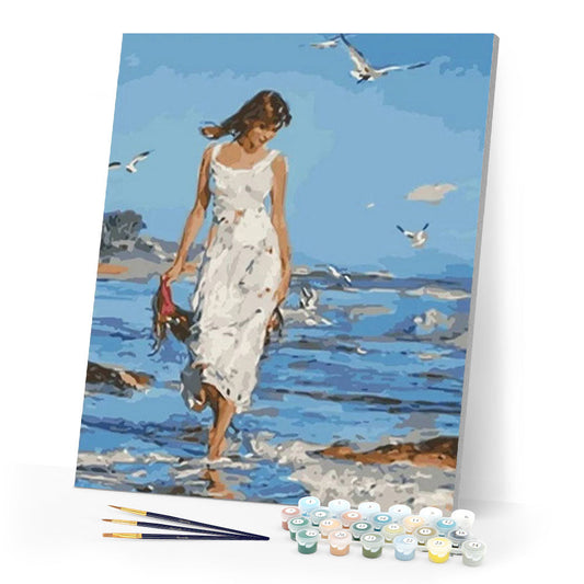 Woman walking by the Sea
